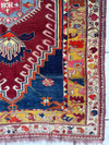 Hand-Knotted Antique Turkish Melas Wool Rug – 4'3" x 5'11" – Vibrant Geometric Motifs