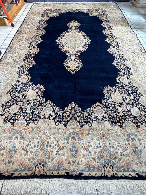 Palace-Size Vintage Royal Kirman Wool Rug – 9’9” x 17’2” – Hand-Knotted Persian Elegance with Deep Navy Field