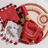 Ruffle edge straw coasters, red