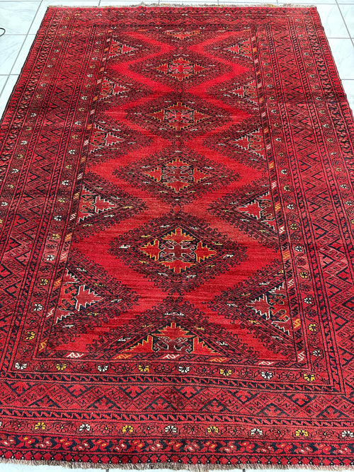 Hand-Knotted Afghan Turkoman Waziri Wool Rug – 6'9" x 9'6" – Vintage Red Elegance