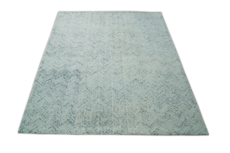 5x8 and 8x10 Hand Made Woolen Modern Blue and Ivory Area Rug | EVE001