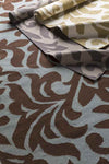 Manzanola Global Dark Chocolate Area Rug