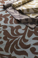 Manzanola Global Dark Chocolate Area Rug