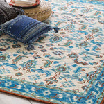 Treherne Traditional Blue Area Rug