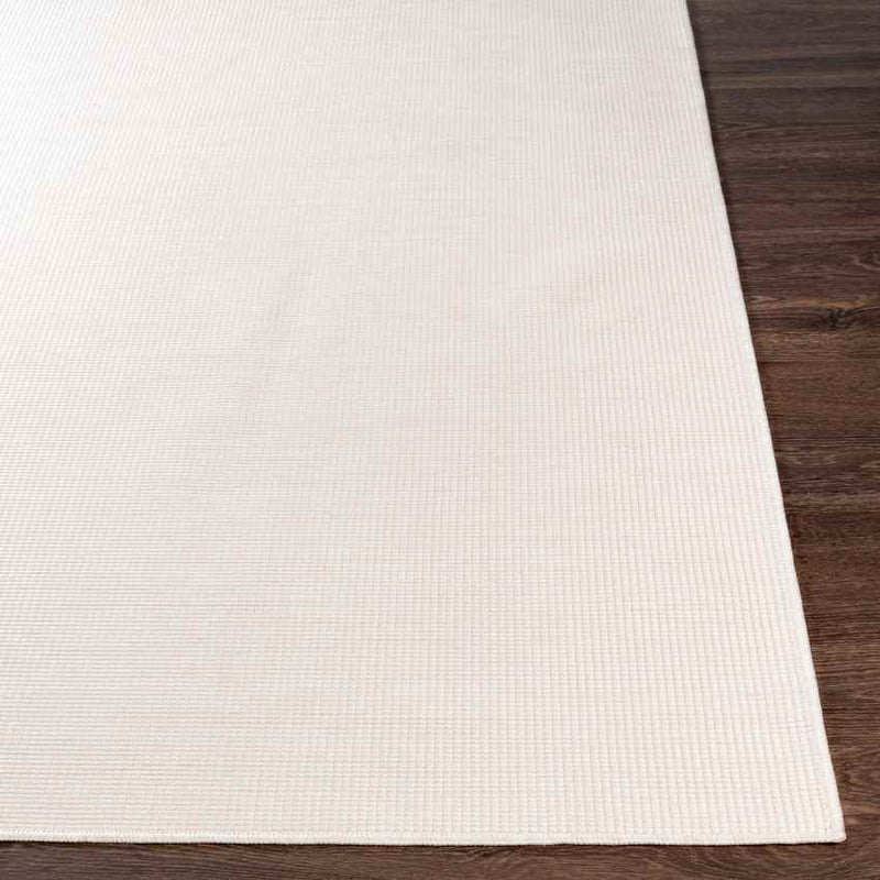 Tonsel Traditional Cream Area Rug