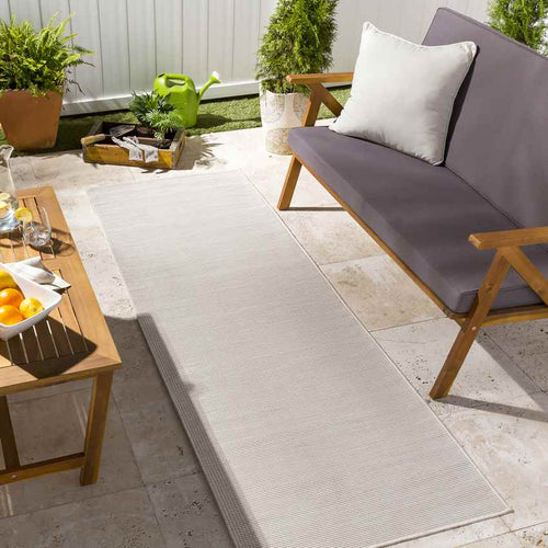Tonsel Traditional Cream Area Rug