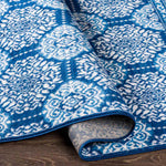 Beugen Traditional Blue Area Rug
