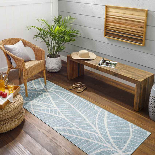 Smolan Coastal Light Teal Area Rug