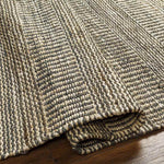 Cylinder Rustic Black/Tan Area Rug