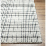 Ishaq Solid and Border Light Silver Area Rug