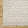 Clinten Solid and Border Tan Area Rug