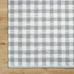 Jamaris Solid and Border Ivory Area Rug
