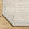 Janmichael Solid and Border Tan Area Rug