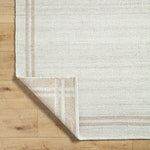 Janmichael Solid and Border Ivory Area Rug