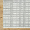 Ishaq Solid and Border Light Grey Area Rug