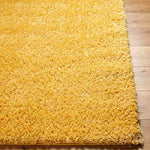 Charon Shag Saffron Area Rug