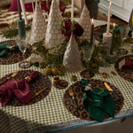 Animal pattern hand beaded placemat, gold