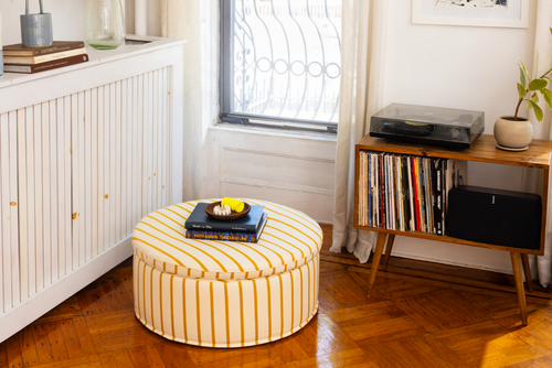 The Evergreen Ottoman in a Striped Hemp Blend