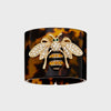 Stripey bee resin napkin rings, tortoiseshell, set of four