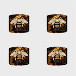 Stripey bee resin napkin rings, tortoiseshell, set of four