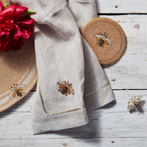 Stripey bee linen dinner napkins, flax, set of two