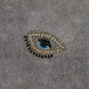 Embroidered evil eye pillow, grey cotton velvet