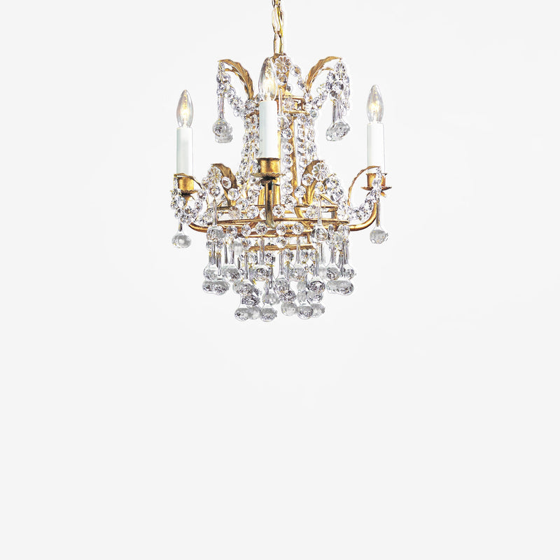 Antique gold mini iron chandelier with crystals.