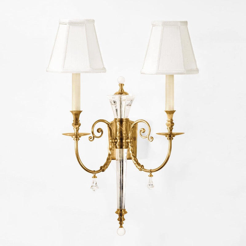 Brass and crystal wall sconce.
