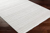 Cira Ivory Textured Area Rug with Fringes