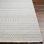 Cira Ivory Textured Area Rug with Fringes