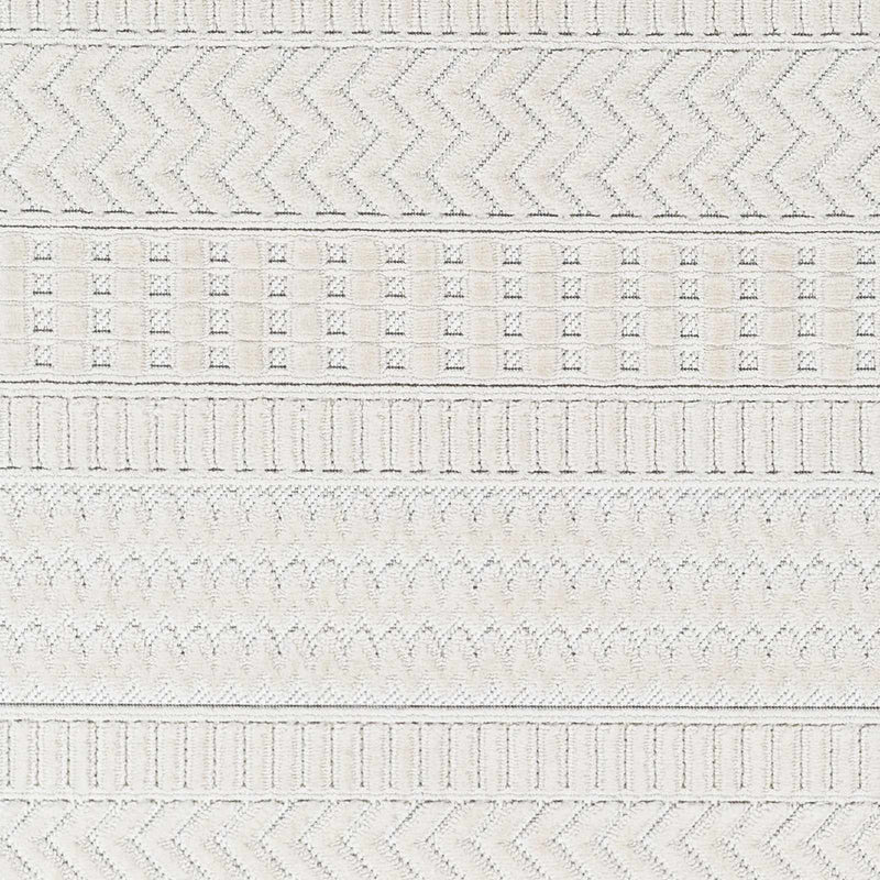 Cira Ivory Textured Area Rug with Fringes