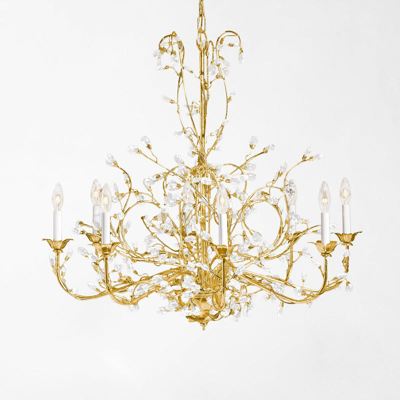 Gold chandelier with crystal drops.