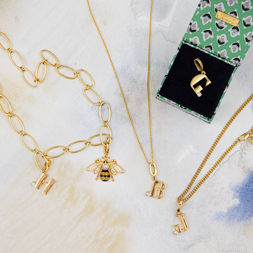Monogram charm, E