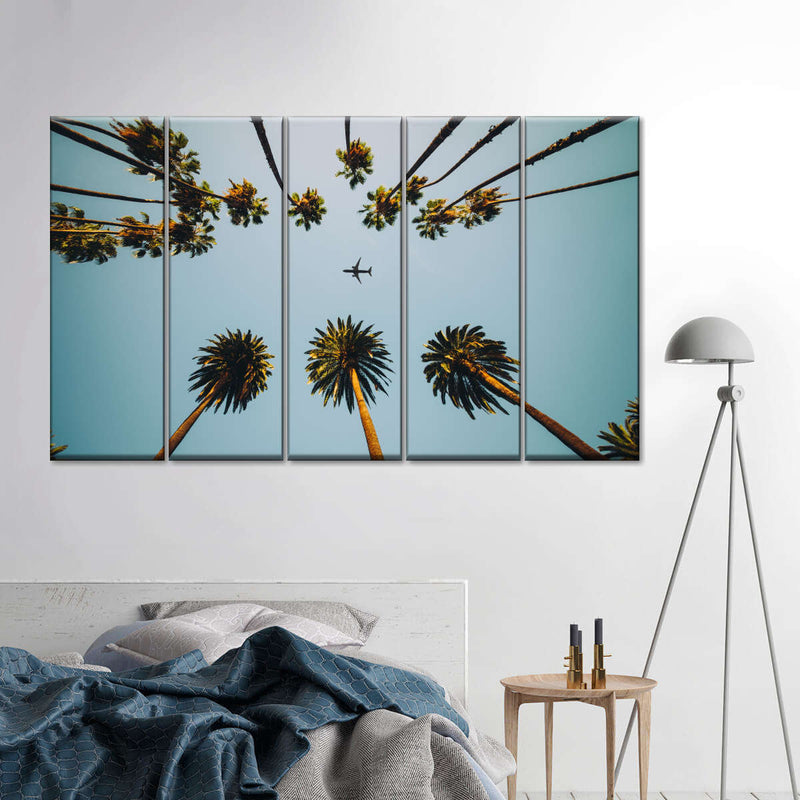 Plane Below Palm Trees Wall Art