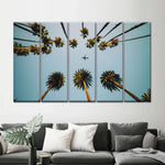 Plane Below Palm Trees Wall Art