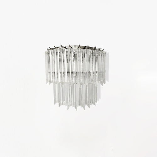 Clear glass sconce with nickel hardware.