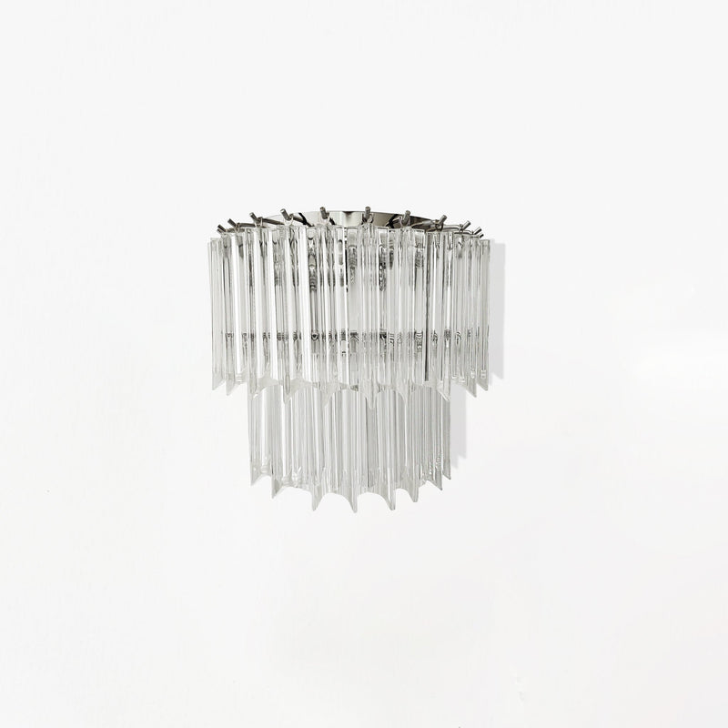 Clear glass sconce with nickel hardware.