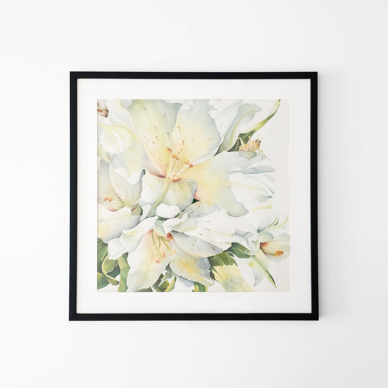 Painting of a white flower with a grasshopper in a black frame.